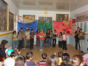 At-risk youth perform at a school in Lagich through a program developed by Elnur Kalantarov, Chief of Press Relations with Azerbaijan's Ministry of Labor and Social Protection and USAID Community Connections alumnus.