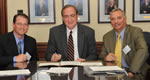 The U.S. Environmental Protection Agency today designated Auburn University as a Center of Excellence for Watershed Management. Participating in the  signing of a memorandum of understanding were (left to right) Trey Glenn, director of the Alabama Department of Environmental Management, Jay Gogue, president of Auburn University, and Jim Giattina, director of the EPA Region 4 Water Management Division.