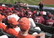 photo - Teenagers sitting in the stands at Hoot's 'Chalk Talks'