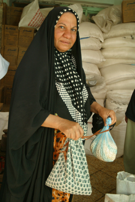 USAID-funded program, in coordination with the Coalition Provisional Authority, provides basic commodities to the needy in Southern Iraq. The local agent and his family service 168 families (897 people) from the supplies stored in their home. On November 21, 2003, this public distribution system will be transitional to the Iraqi government.

