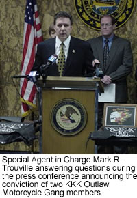 Special Agent in Charge Mark R. Trouville answering questions during the press conference announcing the conviction of two KKK Outlaw Motorcycle Gang members.