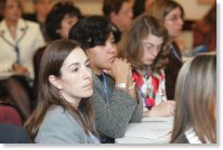 Breakout session participants take notes to remember new ideas and begin the development of Individual Plans of Action. 