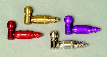 Photograph of four small pipes used for smoking crack cocaine.