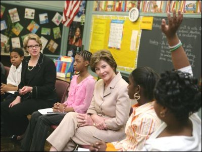 Secretary Spellings and First Lady Laura Bush talk with students at Avon Avenue Elementary School in Newark, New Jersey, where Mrs. Bush announced a Striving Readers grant to Newark Public Schools.  White House Photo by Shealah Craighead