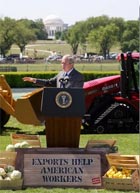 President Bush delivers remarks on May 23, 2008, on the South Lawn of the White House. He is seen with an array of products manufactured or grown in the U.S. White House photo by Joyce N. Boghosian.