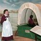 Volunteers assist with the river crossing reenactment at the Trails Center in Casper, Wyoming.