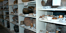 Hopi pottery in museum storage.