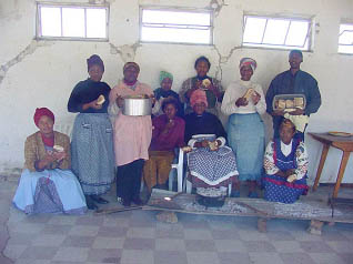 Siyakhana-Baking-Project members show how they used to bake. 