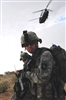 U.S. Army soldiers wait to be extracted during an air assault mission, Operation Bessemer, near Bayji, Iraq, Aug. 21, 2008. 