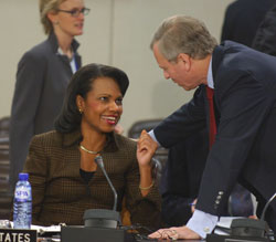 Secretary Rice speaks with Secretary General de Hoop Scheffer while visiting the NATO headquarters on Friday, December 7, 2007.  State Department photo by Didier Vandenbosch. 