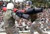 U.S. Air Force Academy basic cadets Bethany Blackburn, right, and Allison Ceranski fight with pugil sticks during the women's Big Bad Basic finals at the U.S. Air Force Academy in Colorado, July 26, 2008. Blackburn won, earning the title "Big Bad Basic."