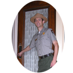 A National Park Ranger welcomes you at the front door of the JFK birthplace.