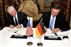 U.S. Defense Secretary Robert M. Gates and German Minister of Defense Dr. Franz Josef sign a defense agreement during the 44th Munich Conference on Security Policy in Munich, Germany, Feb. 9, 2008.