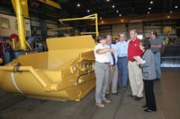 Carol Lindsey gives Governor Doyle and Secretary Gassman a tour of Ashland Industries. Also pictured is Senator Bob Jauch.