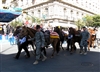Soldiers escort 31 riderless horses, with the traditional empty boots in the stirrups of their saddles to honor the troops they lost while deployed in Iraq, during a homecoming parade in El Paso, Texas, Feb. 27, 2008. The soldiers are assigned to the 1st Infantry Division's 4th Brigade Combat Team.