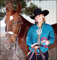 Taylor Benton of Midland, Texas, overall youth champion at the 2007 Expo, poses with her winning horse, Caira.