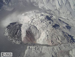 This photograph from October 4, 2004 shows the enlarging new dome on the south (left) side of the volcanic dome formed in the 1980’s after the eruption of Mount St. Helens.