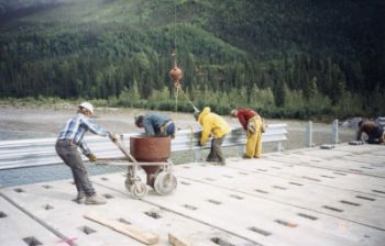 Crews work on a bridge deck replacement along the Dalton Highway.