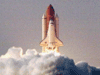 Space Shuttle Endeavour roars off the launch pad.