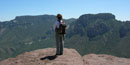 A lone hiker at the top of the Lost Mine Trail