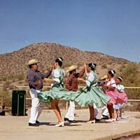 Members of Ballet Folklorico Mexicapan perform May 16, 1999