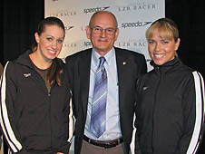 NASA researcher Steve Wilkinson with US swimmers Katie Hoff (l) and Natalie Coughlin (r)