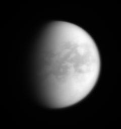 Prominent dark areas found in the Titan's equatorial region appear to contain vast and continuous dune fields, discovered by the Cassini Radar experiment and likely composed of particles that drop from Titan's unique, smoggy atmosphere