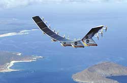 The solar-powered Helios Prototype aircraft, piloted by remote control, soars above the Hawaiian Islands.