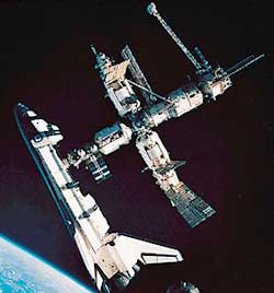 A historic docking occurred in 1995, when the United States space shuttle Atlantis, left, became the first U.S. spacecraft to link up with Russia's space station Mir, right.