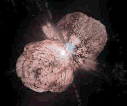 A spectacular explosion on the star Eta Carinae about 150 years ago produced three huge clouds of gas and dust -- two puffy lobes and a thin disk.