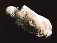 The asteroid Ida is about 35 miles (55 kilometers) long. It is one of thousands of asteroids in the asteroid belt, a region between the orbits of Mars and Jupiter.