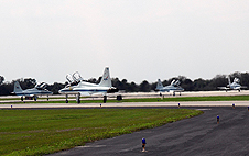 STS-123 astronauts depart Kennedy in their jets