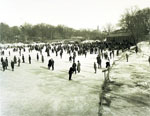 People skating on a lake