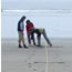 three people on beach