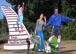 Three outdoor murals promoting physical activity and good nutrition