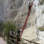 Image of park rangers monitoring a crack in Inscription Rock.
