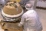 This movie shows rehearsal of the initial processing of the sample return 
capsule when it is taken to a temporary cleanroom at Utah's Test and 
Training Range