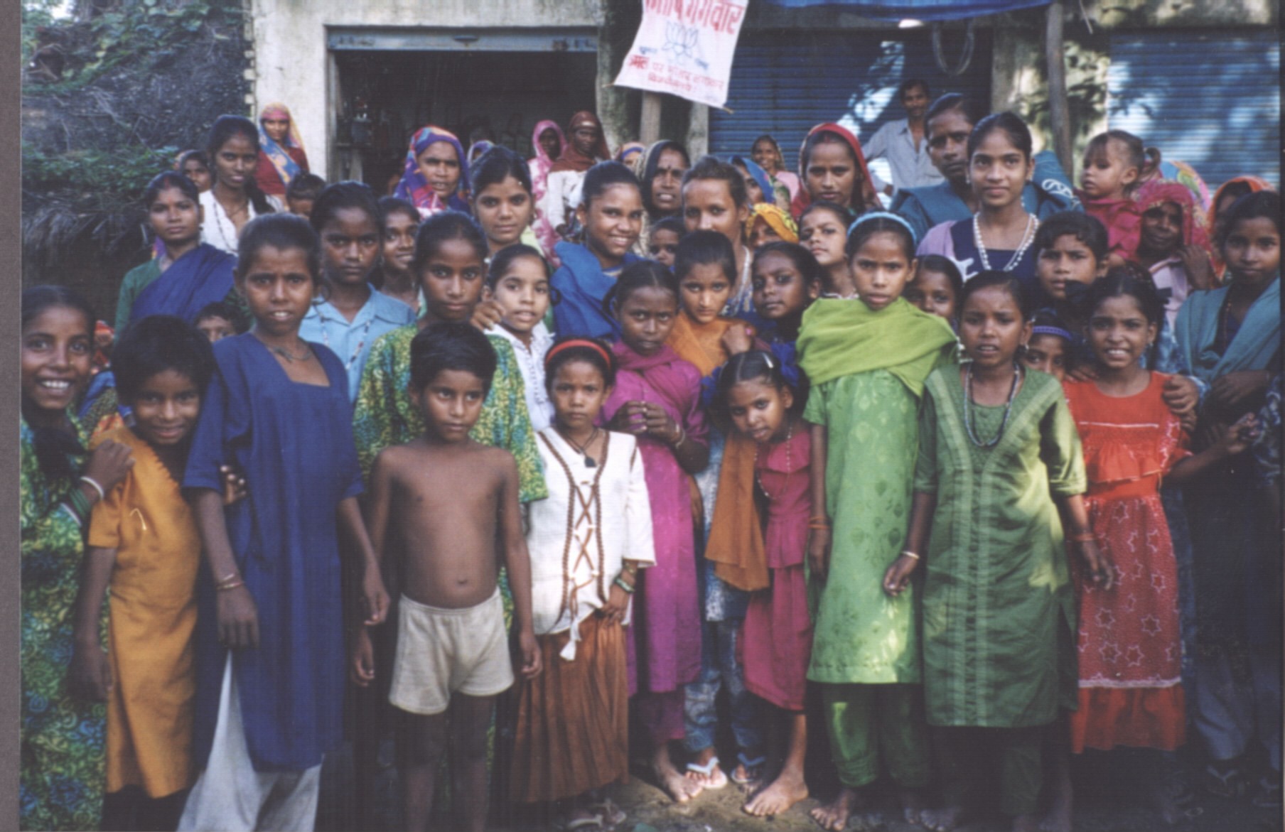 Large crowd of people in India posing for picture