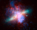 NASA's Spitzer, Hubble and Chandra space observatories teamed up to create 
this multi-wavelength, false-colored view of the M82 galaxy. The lively 
portrait celebrates Hubble's 