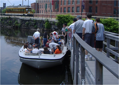 A NPS Park boat prepares to take visitors on a Canal Tour.