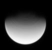 The rapidly rotating clouds above Titan's northernmost latitudes stretch into streaks that circumscribe the pole. The ultraviolet spectral filter used to take this image allows the Cassini spacecraft to view the moon's stratosphere