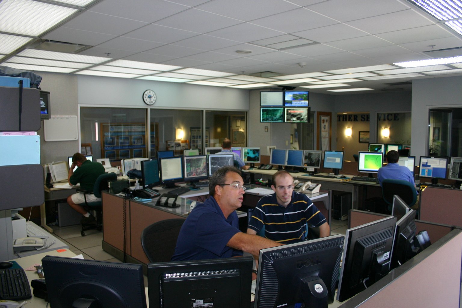 A photo of the main operations room in the forecast office.