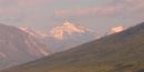 A snowy Mount Igikpak on a sunny day.