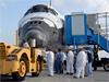 Shuttle personnel safe the orbiter after landing