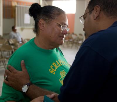 Patillas, Puerto Rico, October 5, 2008 -- FEMA Federal Coordinating Officer, Justo Hernandez talks with disaster victim, Delia Laboy Rodriguez in ...