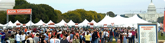 People gathered in front of Book Festival pavilions with the Capitol in the background