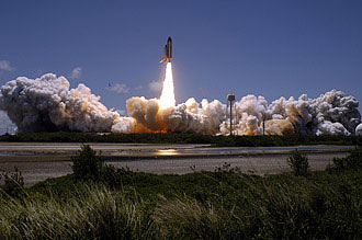 Space Shuttle Discovery launches into space on mission STS-121