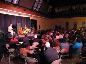 Members of the Jazz Disciples entertain the crowd in the auditorium of Brown v. Board of Education National Histroic Site.