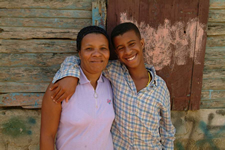 Image of a woman and boy hugging