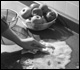 Kitchen counter being cleaned after food preparation.